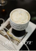 Camellia-shaped scented candle